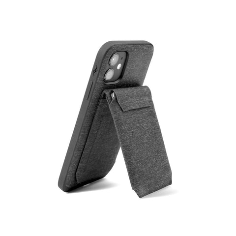An iphone with Everyday case attached to a Stand wallet holding it in portrait mode